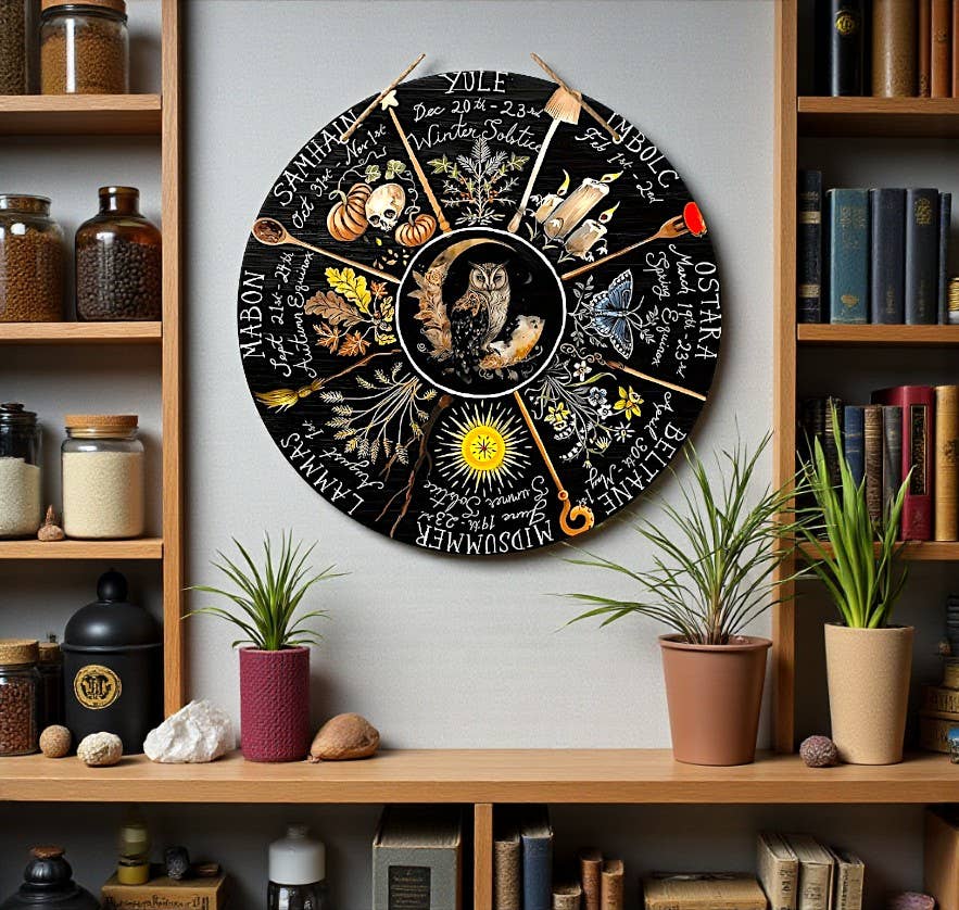 Decorative wall hanging with nature-themed design hanging above a shelf with plants and books.